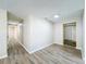 Bright hallway with hardwood floors at 1709 E Sitka St, Tampa, FL 33604
