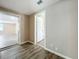 Bright hallway with wood-look flooring and access to other rooms at 1709 E Sitka St, Tampa, FL 33604
