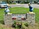 Royal Dutch 2385 building sign with brick base and Dutch themed accents at 2385 Tahitian Ln # 63, Clearwater, FL 33763
