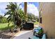 Relaxing patio with seating and a grill at 5806 Candytuft Place, Land O Lakes, FL 34639