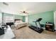 Large bedroom with a treadmill and plenty of space at 5806 Candytuft Place, Land O Lakes, FL 34639