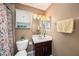 Clean bathroom with a shower/tub combo and vanity at 5806 Candytuft Place, Land O Lakes, FL 34639