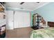 Spacious bedroom with ample closet space and light flooring at 1861 Toucan Way # 1203, Sarasota, FL 34232