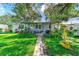Home backyard with patio and landscaping at 5104 S 66Th St, Tampa, FL 33619