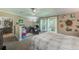 Bedroom with built-in workspace and garden views at 5104 S 66Th St, Tampa, FL 33619