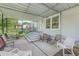 Covered patio with comfortable seating, providing a relaxing outdoor space at 5104 S 66Th St, Tampa, FL 33619