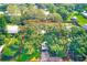 Aerial view of property showing home and surrounding trees at 5104 S 66Th St, Tampa, FL 33619