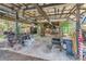 Open-air workshop area with tools and equipment at 5104 S 66Th St, Tampa, FL 33619