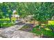 Home with carport and a large grassy area at 5104 S 66Th St, Tampa, FL 33619