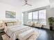 Bright and airy bedroom with city views and comfy seating at 920 N Osceola Ave # 703, Clearwater, FL 33755