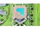 Heart-shaped community pool and surrounding area at 19065 Malinche Loop, Spring Hill, FL 34610