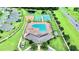 Community pool, playground, and tennis courts at 19065 Malinche Loop, Spring Hill, FL 34610