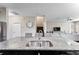 Kitchen island with granite countertop and double sink at 19065 Malinche Loop, Spring Hill, FL 34610