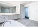 Elegant bathroom with double vanity and a free-standing tub at 920 N Osceola Ave # 703, Clearwater, FL 33755