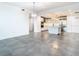 Modern kitchen featuring white cabinetry, stainless steel appliances, and an island at 920 N Osceola Ave # 703, Clearwater, FL 33755
