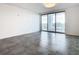 Living room with sliding glass doors and balcony access at 920 N Osceola Ave # 703, Clearwater, FL 33755
