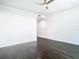 Modern bedroom featuring dark hardwood floors and large window at 920 N Osceola Ave # 703, Clearwater, FL 33755