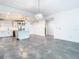 Modern kitchen with white cabinets, island, and stainless steel appliances at 920 N Osceola Ave # 703, Clearwater, FL 33755