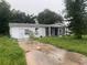 One-story home with a large yard needing landscaping at 1908 51St W Ave, Bradenton, FL 34207