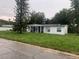 One-story home with a large yard needing landscaping at 1908 51St W Ave, Bradenton, FL 34207