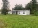 One-story home with a large yard needing landscaping at 1908 51St W Ave, Bradenton, FL 34207