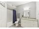 Updated bathroom with granite countertop and a modern vanity at 13113 Sanctuary Cove Dr # 104, Temple Terrace, FL 33637