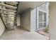 Interior hallway with metal staircase and door at 13113 Sanctuary Cove Dr # 104, Temple Terrace, FL 33637