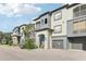 Two story building exterior with gray and blue accents at 13113 Sanctuary Cove Dr # 104, Temple Terrace, FL 33637