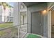 Private screened patio with access to grassy backyard at 13113 Sanctuary Cove Dr # 104, Temple Terrace, FL 33637