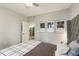Spacious bedroom with a plush bed and framed artwork at 13113 Sanctuary Cove Dr # 104, Temple Terrace, FL 33637