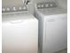 White washer and dryer set in a closet at 10438 Shady Preserve Dr, Riverview, FL 33578