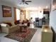 Open living room with seating area, and views into the kitchen at 10438 Shady Preserve Dr, Riverview, FL 33578
