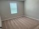 Spacious bedroom with carpeted floor and window with blinds at 13116 Shumard Way, Riverview, FL 33579