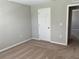 Bright bedroom with neutral walls, carpet, and closet at 13116 Shumard Way, Riverview, FL 33579