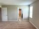 Bedroom with access to hallway and another room at 13116 Shumard Way, Riverview, FL 33579