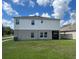 Two-story house with backyard and screened patio at 13116 Shumard Way, Riverview, FL 33579