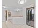 Tiled entryway leading to living room and patio at 300 S Florida Ave # 500C, Tarpon Springs, FL 34689