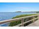 Scenic boardwalk offering peaceful water views and benches at 300 S Florida Ave # 500C, Tarpon Springs, FL 34689