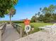 Relaxing backyard oasis with lounge chairs and access to the water at 300 S Florida Ave # 500C, Tarpon Springs, FL 34689