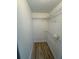 Spacious closet with wire shelving and laminate flooring at 8518 N Edison Ave, Tampa, FL 33604