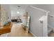 Bright entryway with tile floor, console table, mirror, and view of living area at 15630 Greenleaf Bay St, Sun City Center, FL 33573