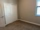 Bedroom with neutral walls and carpet flooring at 13240 Satin Lily Dr, Riverview, FL 33579