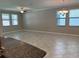 Spacious living room with tile floors and ceiling fan at 13240 Satin Lily Dr, Riverview, FL 33579
