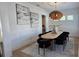 Bright dining room featuring decorative light fixture and modern decor for an inviting space at 559 W Davis Blvd, Tampa, FL 33606