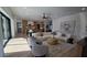 Inviting living room with stylish furniture, open layout, and seamless access to the modern kitchen at 559 W Davis Blvd, Tampa, FL 33606