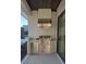 Outdoor kitchen featuring a grill, refrigerator, and stainless steel appliances, perfect for outdoor gatherings at 559 W Davis Blvd, Tampa, FL 33606