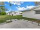 Backyard patio with flagstone walkway and grassy area at 9820 44Th N Way, Pinellas Park, FL 33782