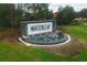 An inviting Waterleaf community sign with lush landscaping and a decorative water feature at 11892 Frost Aster Dr, Riverview, FL 33579