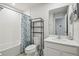 Clean bathroom with shower/tub combo and modern vanity at 3062 Victoria Inlet Dr, Holiday, FL 34691