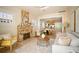Open-concept living room boasts a stone fireplace and seamless flow into the dining area and kitchen at 440 22Nd N St, St Petersburg, FL 33713